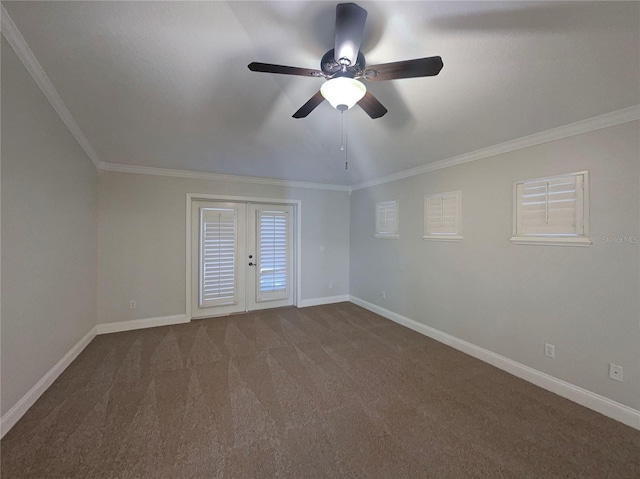 carpeted empty room with ceiling fan, french doors, and ornamental molding