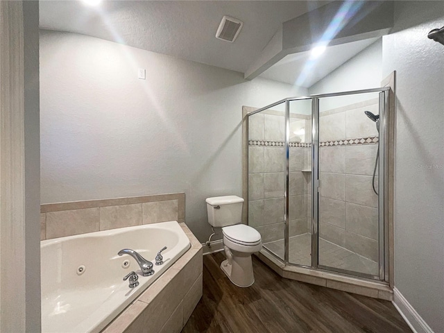 bathroom featuring separate shower and tub, wood-type flooring, and toilet