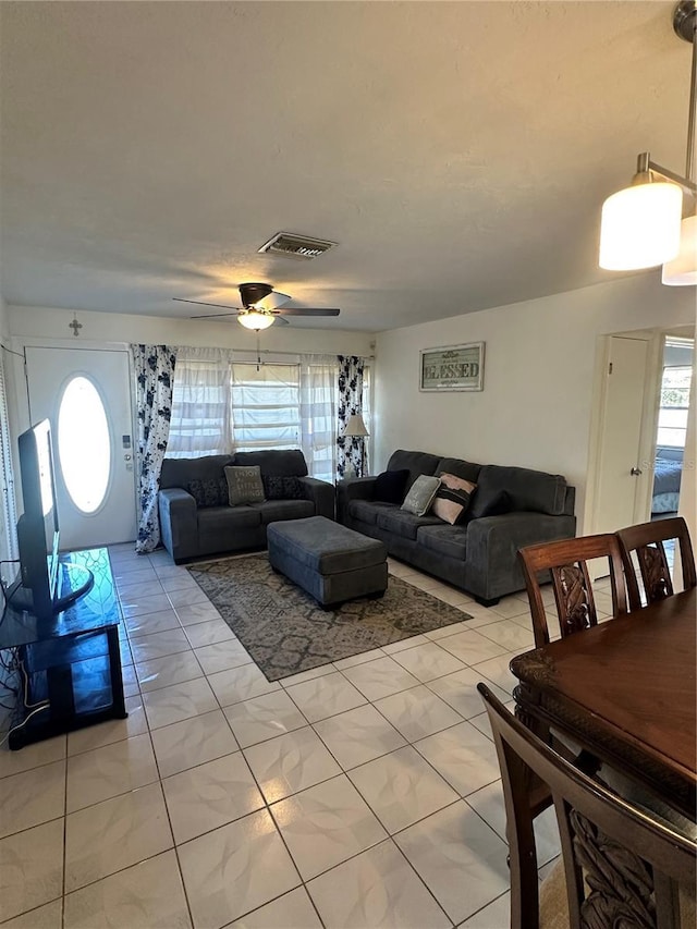 living room featuring ceiling fan