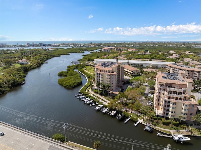 drone / aerial view with a view of city and a water view