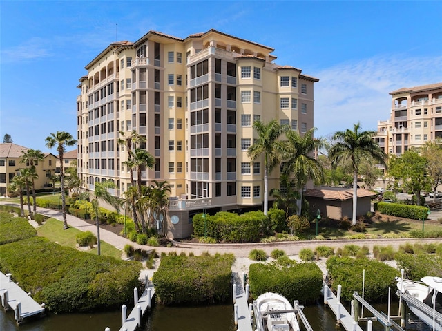 view of property featuring boat lift and a water view