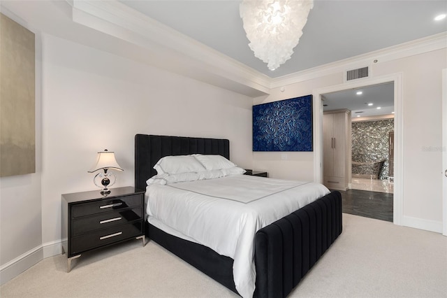 bedroom with visible vents, ornamental molding, baseboards, light colored carpet, and a chandelier