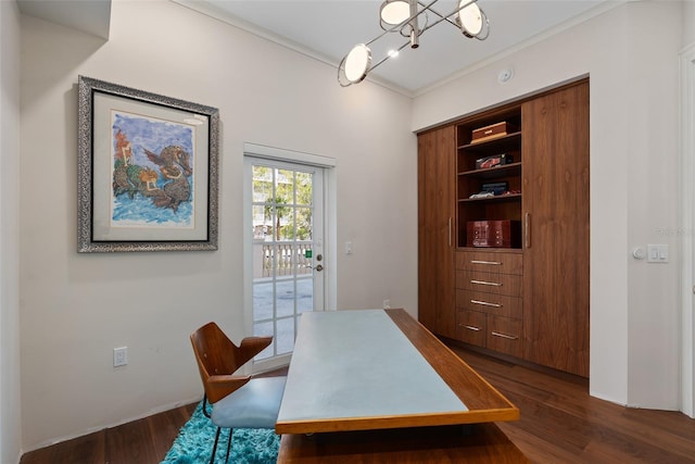 home office featuring an inviting chandelier, dark wood-style flooring, and crown molding