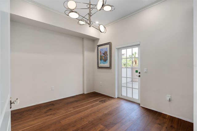 interior space featuring a chandelier and hardwood / wood-style floors