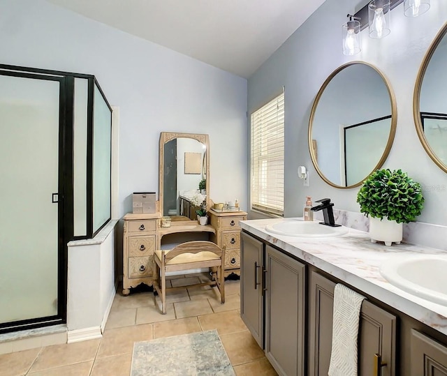 4217 Sky Flower Ln, Saint Cloud, FL 34772 - bathroom featuring tile patterned floors, double vanity, and a stall shower