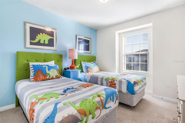 bedroom with light colored carpet