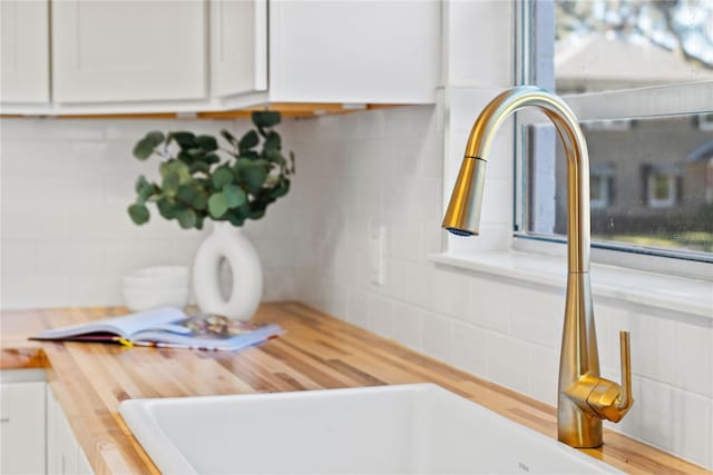 details with sink and decorative backsplash