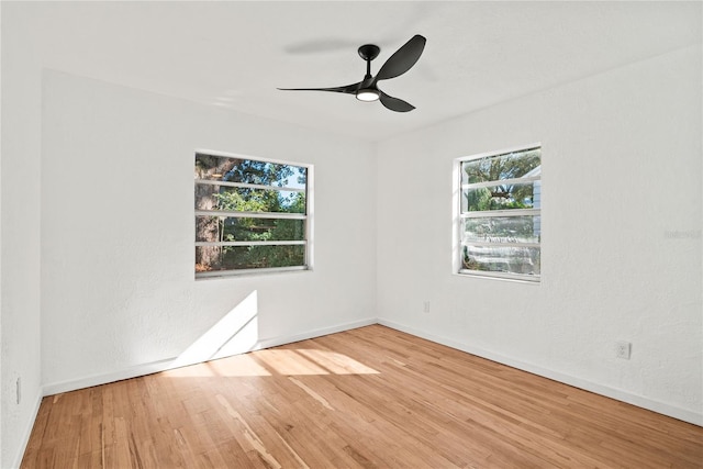 unfurnished room featuring ceiling fan and wood-type flooring