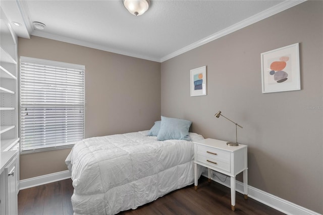 bedroom with dark hardwood / wood-style floors and ornamental molding