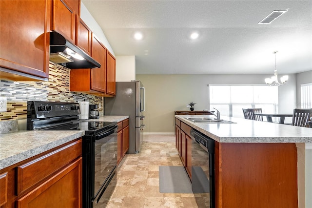 kitchen featuring a kitchen island with sink, sink, black appliances, pendant lighting, and a notable chandelier