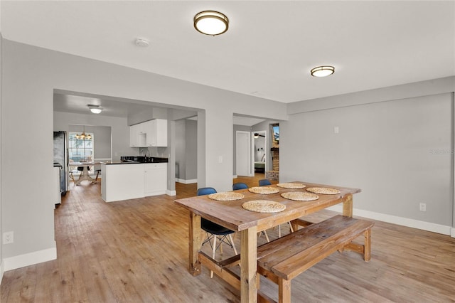 dining space featuring light hardwood / wood-style flooring