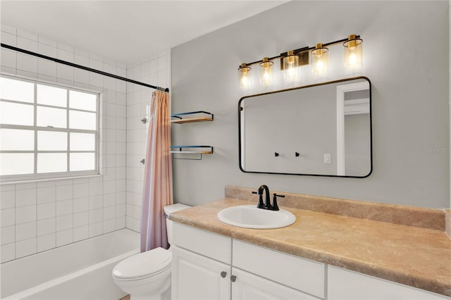 full bathroom featuring vanity, toilet, and shower / bathtub combination with curtain