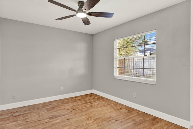 spare room with ceiling fan and light hardwood / wood-style floors