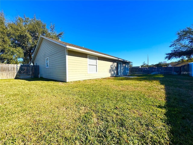 view of home's exterior featuring a lawn