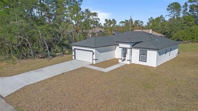 view of front facade featuring a front lawn and a garage