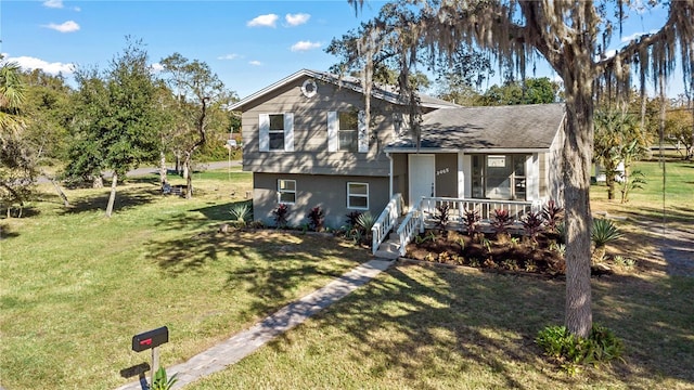 split level home with a front lawn and covered porch