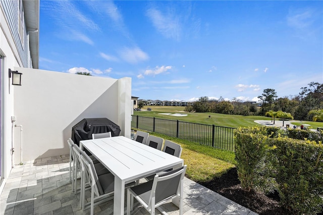 view of patio featuring a grill