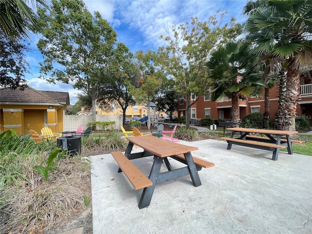 view of community with a patio area