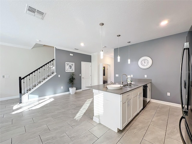 kitchen featuring pendant lighting, dishwasher, sink, kitchen peninsula, and white cabinetry