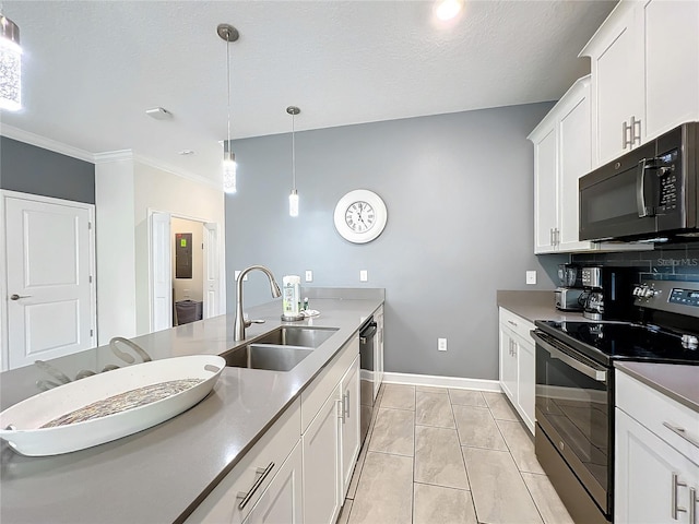 kitchen with pendant lighting, crown molding, sink, white cabinetry, and stainless steel appliances