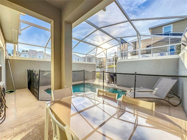 sunroom / solarium with a pool