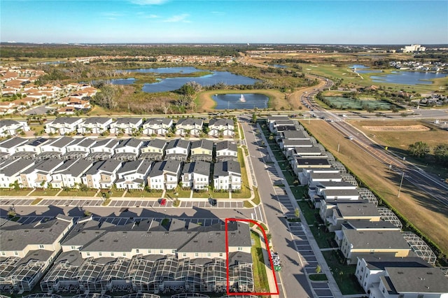 1264 Challenge Dr, Davenport, FL 33896 - aerial view of residential area with a large body of water