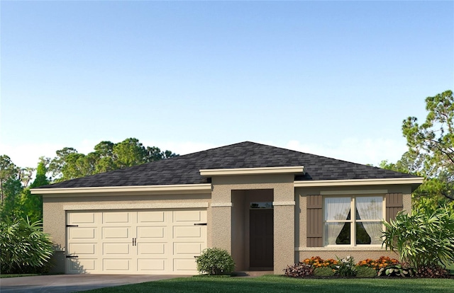 view of front of home with a garage and a front lawn