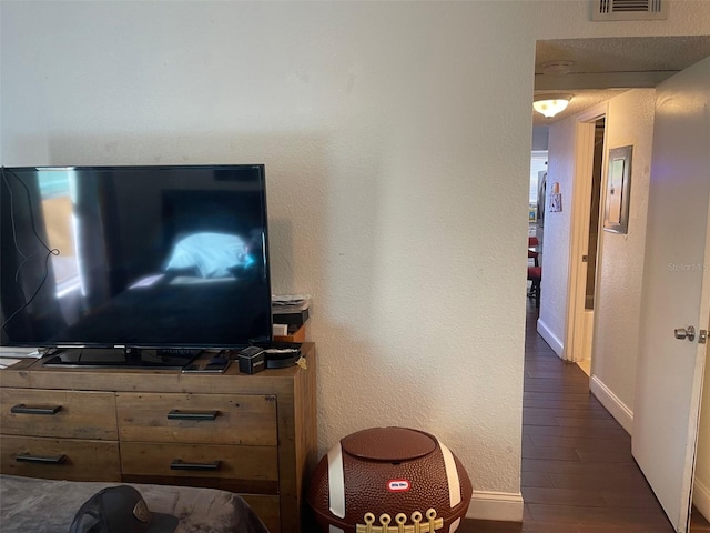 living room with dark hardwood / wood-style floors