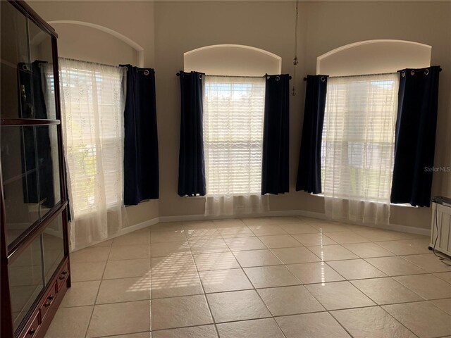 view of tiled spare room