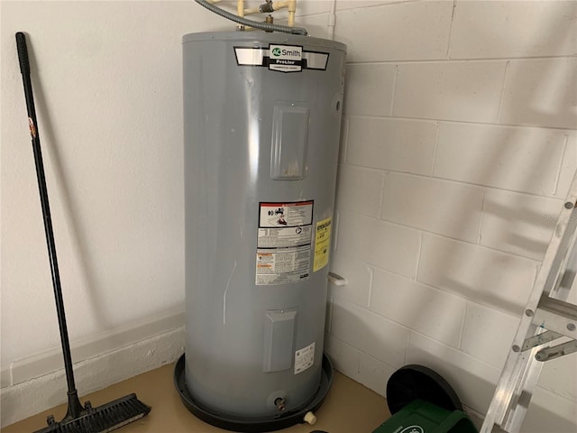 utility room with water heater