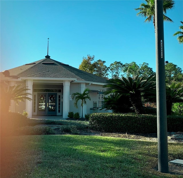 exterior space with a front lawn