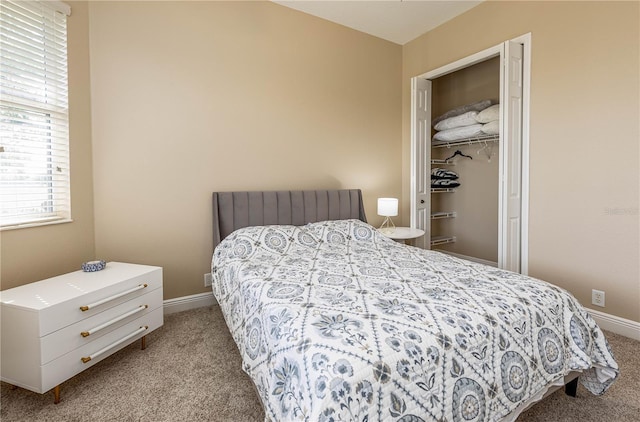 bedroom featuring light carpet and a closet