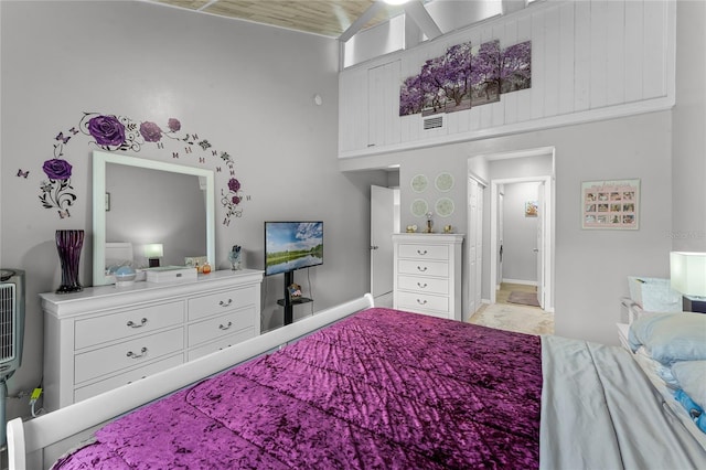 bedroom featuring wooden ceiling and ceiling fan