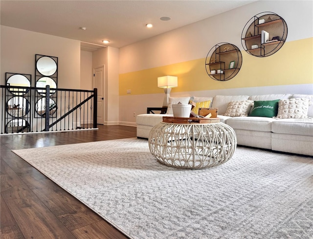 living room with dark hardwood / wood-style floors