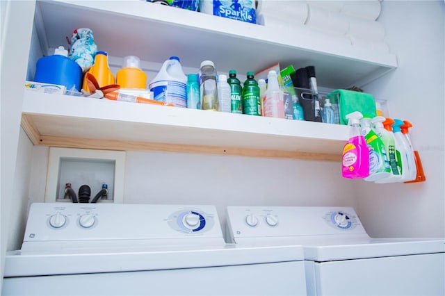 washroom featuring washing machine and clothes dryer