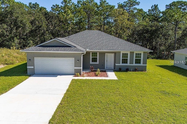 ranch-style home featuring a front lawn and a garage