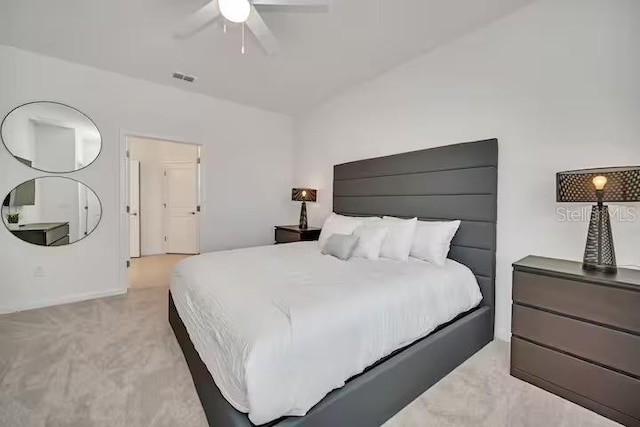 carpeted bedroom featuring ceiling fan