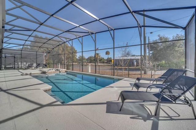 view of pool featuring a patio and a lanai