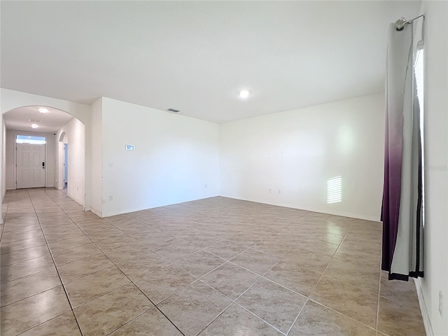 view of tiled spare room