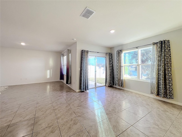 view of tiled empty room