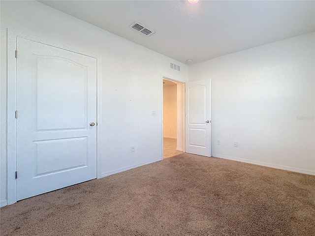 unfurnished bedroom featuring carpet flooring