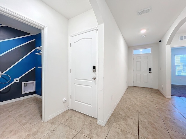 view of tiled foyer entrance