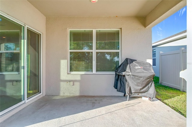 view of patio with a grill