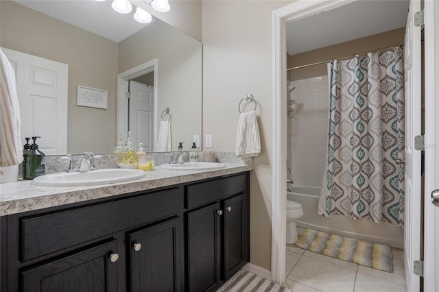 full bathroom featuring vanity, tile patterned floors, toilet, and shower / bath combo with shower curtain