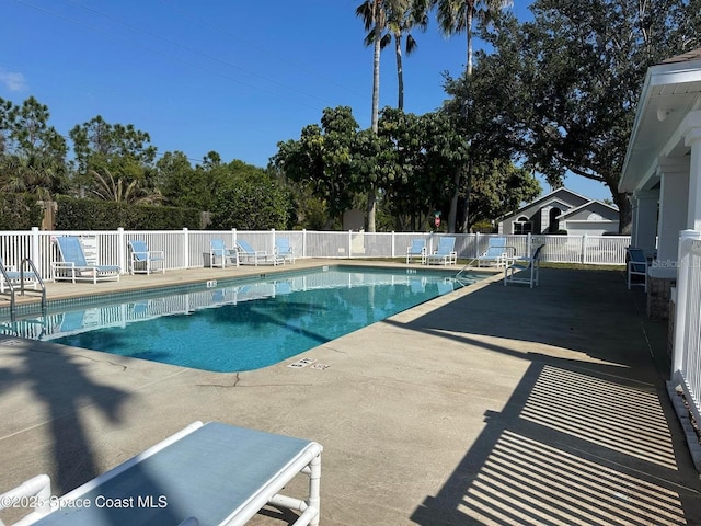 view of pool featuring a patio area