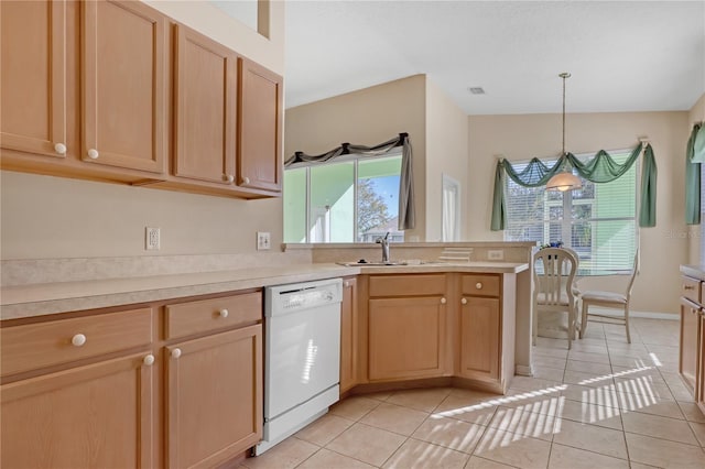 kitchen with pendant lighting, sink, a wealth of natural light, and dishwasher