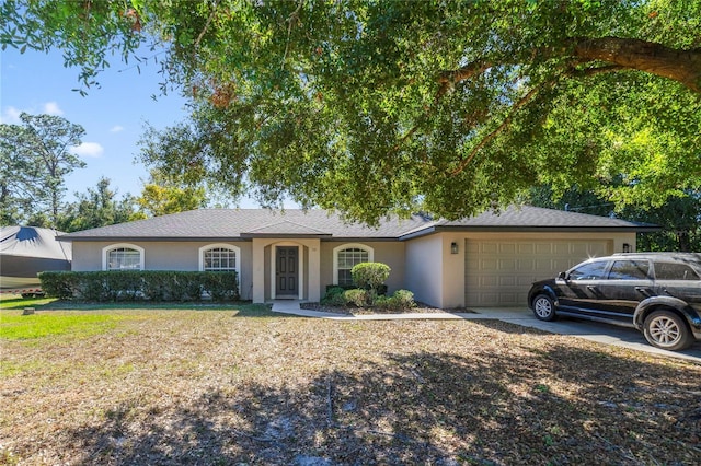 ranch-style home with a garage