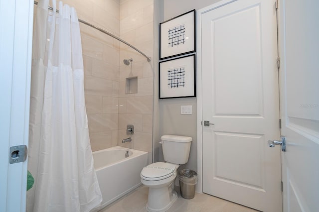 bathroom with toilet and shower / tub combo