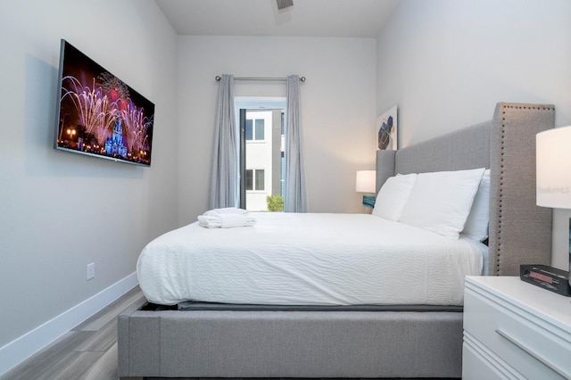 bedroom with light hardwood / wood-style flooring