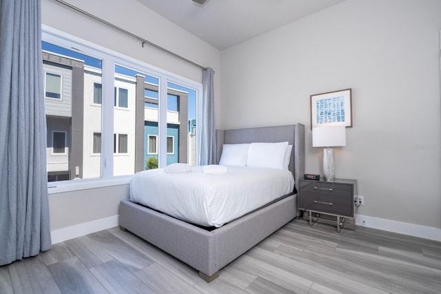 bedroom featuring hardwood / wood-style flooring